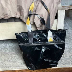 Lesportsac Shiny Black Tote with Yellow and Gray Straps